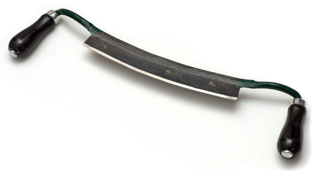 Drawknife from above – traditional two-handled woodworking blade for shaping and shaving wood