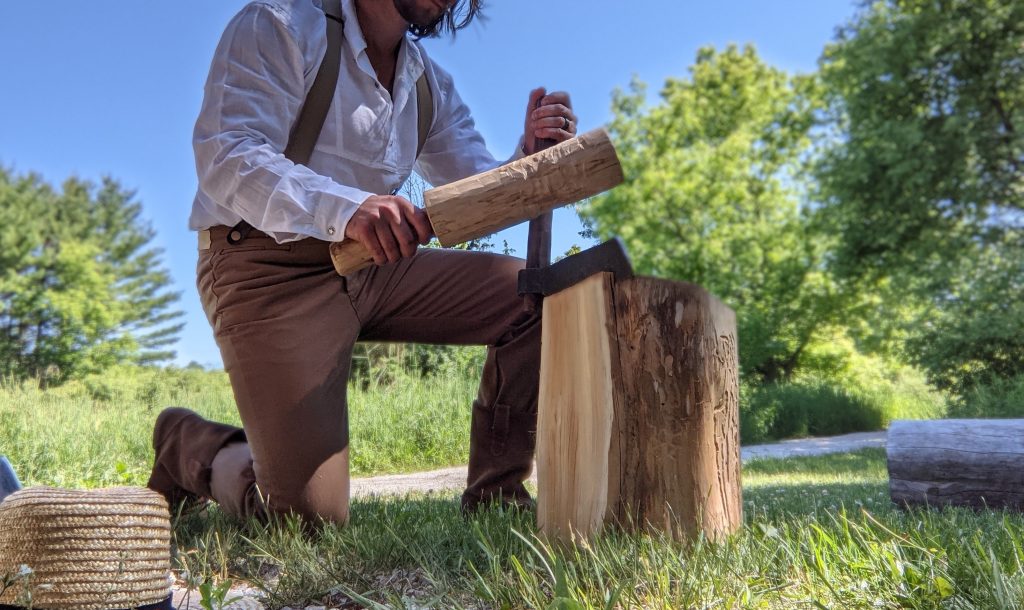 Froe tool on workbench – traditional woodworking cleaving tool for splitting wood along the grain