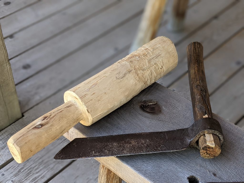 Froe and club side by side – traditional woodworking tools for cleaving shingles and staves