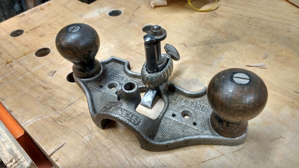 Stanley No. 71 router plane on wooden surface – classic woodworking hand tool for dado and groove work