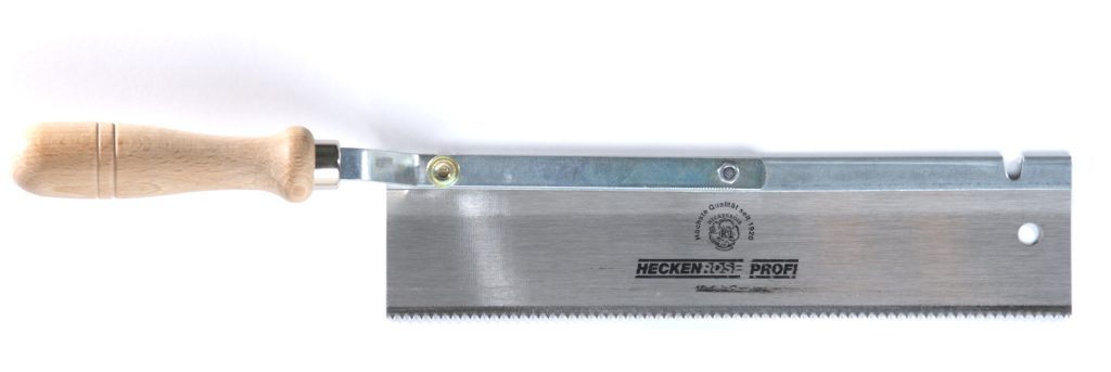 Western tenon saw with brass back spine and wooden handle